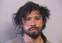 Tulsa adult store burglar breaks through glass door and flees with merchandise